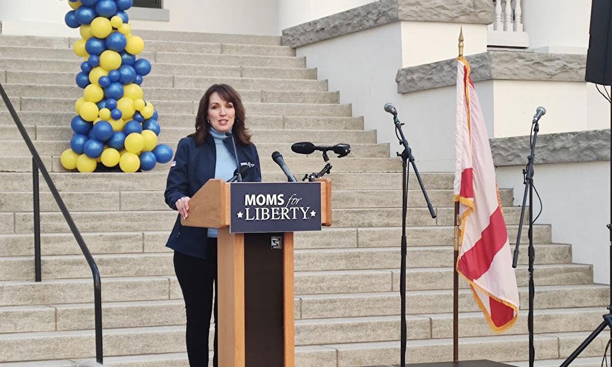 This is a photo of Moms for Liberty co-founder Tina Descovich speaking in front of the old Capitol in Tallahassee.